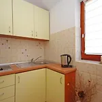 In Apartment *